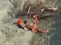 A pair of nature lovers drilled next to a river.